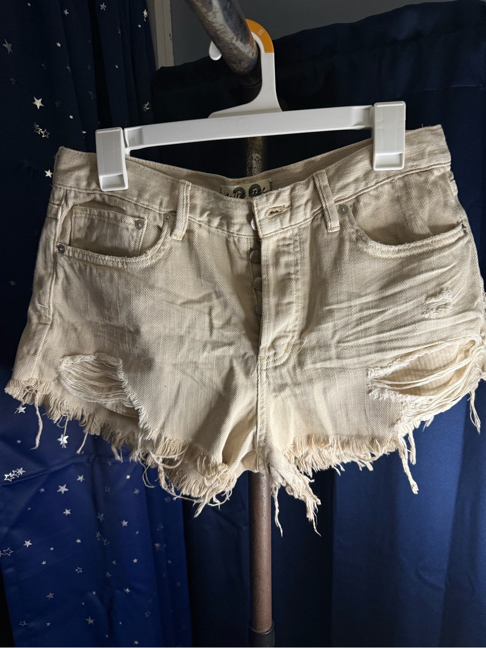 We The Free Distressed Cream Denim Cutoff Shorts